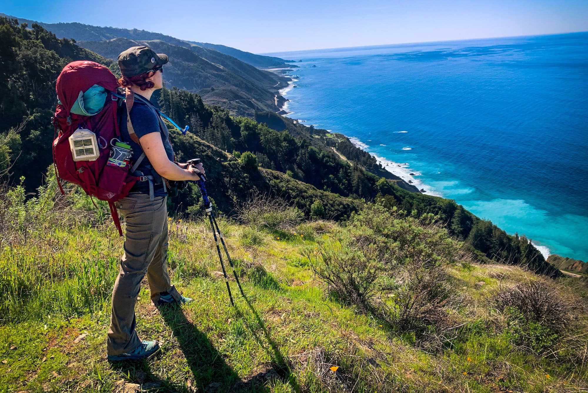 Emily looking out at the Pacific Ocean in Big Sur